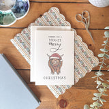 MOO-st Merry Christmas – Highland Cow Christmas Card